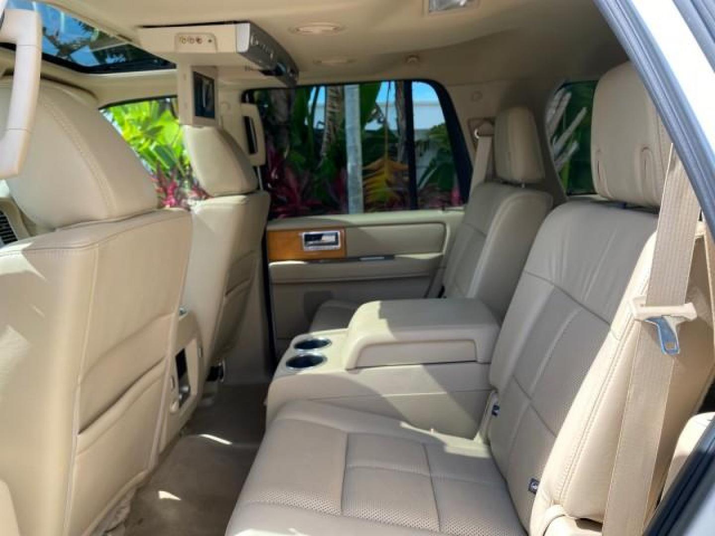 2010 White Platinum Tri-Coat Metallic /Camel Lincoln Navigator 4WD SUNROOF LOW MILES 31,209 (5LMJJ2J50AE) with an 5.4L SOHC 24-Valve V8 FFV Engine engine, Automatic transmission, located at 4701 North Dixie Hwy, Pompano Beach, FL, 33064, (954) 422-2889, 26.240938, -80.123474 - OUR WEBPAGE FLORIDACARS1.COM HAS OVER 100 PHOTOS AND FREE CARFAX LINK 2010 Lincoln Navigator 4 Door Wagon/Sport Utility 5.4L V8 F SOHC 24V Flex Fuel 18 MPG Rear Wheel Drive w/ 4X4 Features 20 Inch Plus Wheels 4WD/AWD A/C Seat(s) ABS Brakes Air Conditioning Alloy Wheels AM/FM Stereo Automatic Transmi- Photo#81