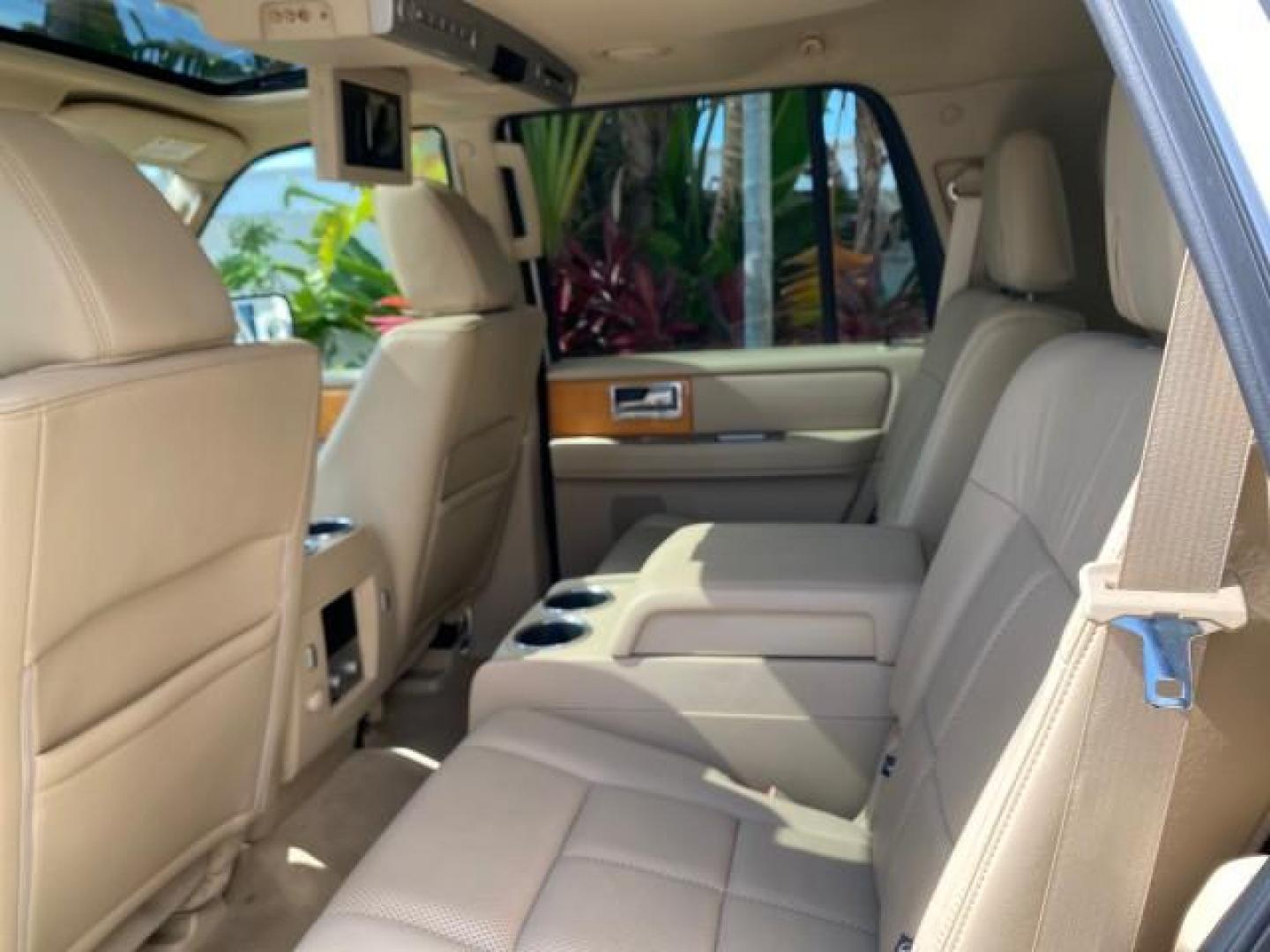 2010 White Platinum Tri-Coat Metallic /Camel Lincoln Navigator 4WD SUNROOF LOW MILES 31,209 (5LMJJ2J50AE) with an 5.4L SOHC 24-Valve V8 FFV Engine engine, Automatic transmission, located at 4701 North Dixie Hwy, Pompano Beach, FL, 33064, (954) 422-2889, 26.240938, -80.123474 - OUR WEBPAGE FLORIDACARS1.COM HAS OVER 100 PHOTOS AND FREE CARFAX LINK 2010 Lincoln Navigator 4 Door Wagon/Sport Utility 5.4L V8 F SOHC 24V Flex Fuel 18 MPG Rear Wheel Drive w/ 4X4 Features 20 Inch Plus Wheels 4WD/AWD A/C Seat(s) ABS Brakes Air Conditioning Alloy Wheels AM/FM Stereo Automatic Transmi- Photo#82