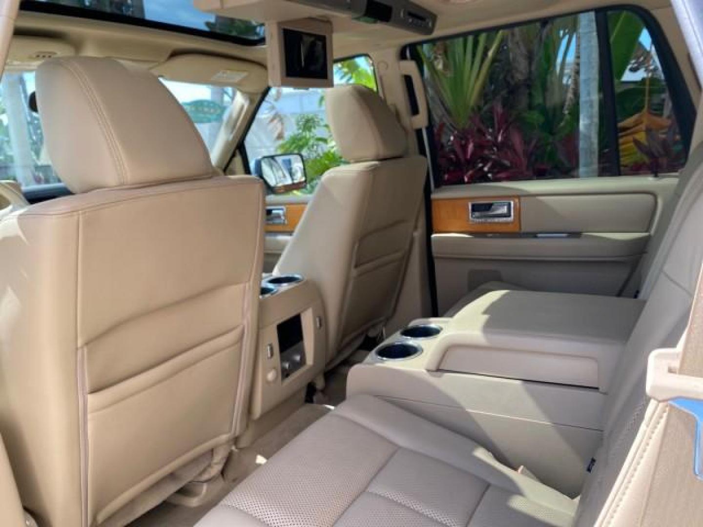 2010 White Platinum Tri-Coat Metallic /Camel Lincoln Navigator 4WD SUNROOF LOW MILES 31,209 (5LMJJ2J50AE) with an 5.4L SOHC 24-Valve V8 FFV Engine engine, Automatic transmission, located at 4701 North Dixie Hwy, Pompano Beach, FL, 33064, (954) 422-2889, 26.240938, -80.123474 - OUR WEBPAGE FLORIDACARS1.COM HAS OVER 100 PHOTOS AND FREE CARFAX LINK 2010 Lincoln Navigator 4 Door Wagon/Sport Utility 5.4L V8 F SOHC 24V Flex Fuel 18 MPG Rear Wheel Drive w/ 4X4 Features 20 Inch Plus Wheels 4WD/AWD A/C Seat(s) ABS Brakes Air Conditioning Alloy Wheels AM/FM Stereo Automatic Transmi- Photo#83