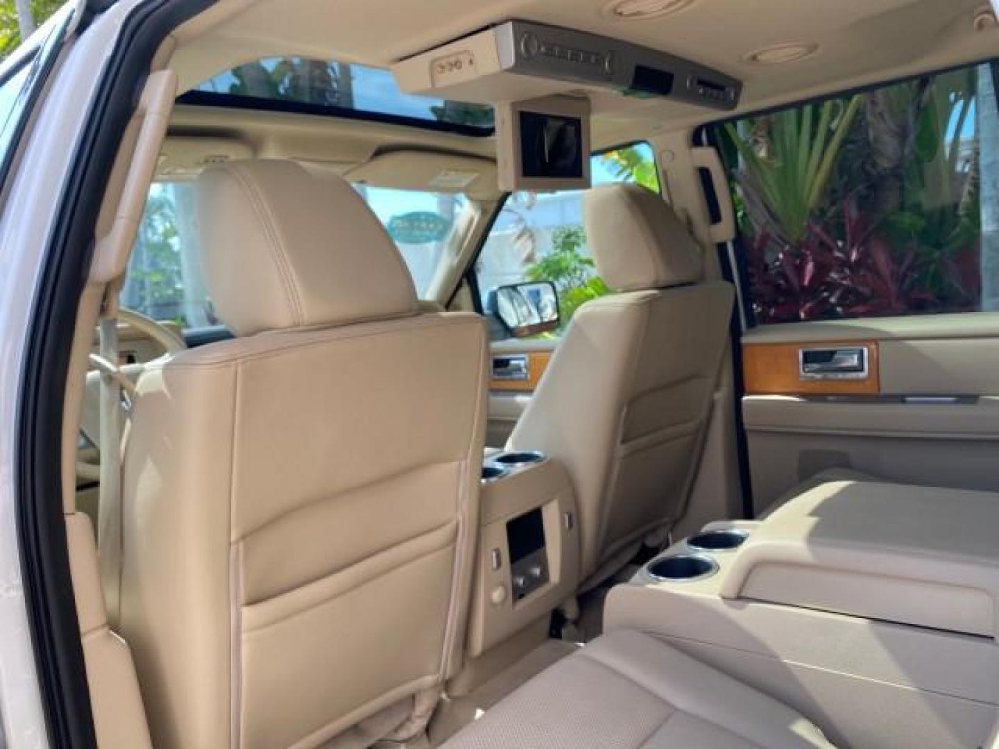 2010 White Platinum Tri-Coat Metallic /Camel Lincoln Navigator 4WD SUNROOF LOW MILES 31,209 (5LMJJ2J50AE) with an 5.4L SOHC 24-Valve V8 FFV Engine engine, Automatic transmission, located at 4701 North Dixie Hwy, Pompano Beach, FL, 33064, (954) 422-2889, 26.240938, -80.123474 - OUR WEBPAGE FLORIDACARS1.COM HAS OVER 100 PHOTOS AND FREE CARFAX LINK 2010 Lincoln Navigator 4 Door Wagon/Sport Utility 5.4L V8 F SOHC 24V Flex Fuel 18 MPG Rear Wheel Drive w/ 4X4 Features 20 Inch Plus Wheels 4WD/AWD A/C Seat(s) ABS Brakes Air Conditioning Alloy Wheels AM/FM Stereo Automatic Transmi- Photo#84