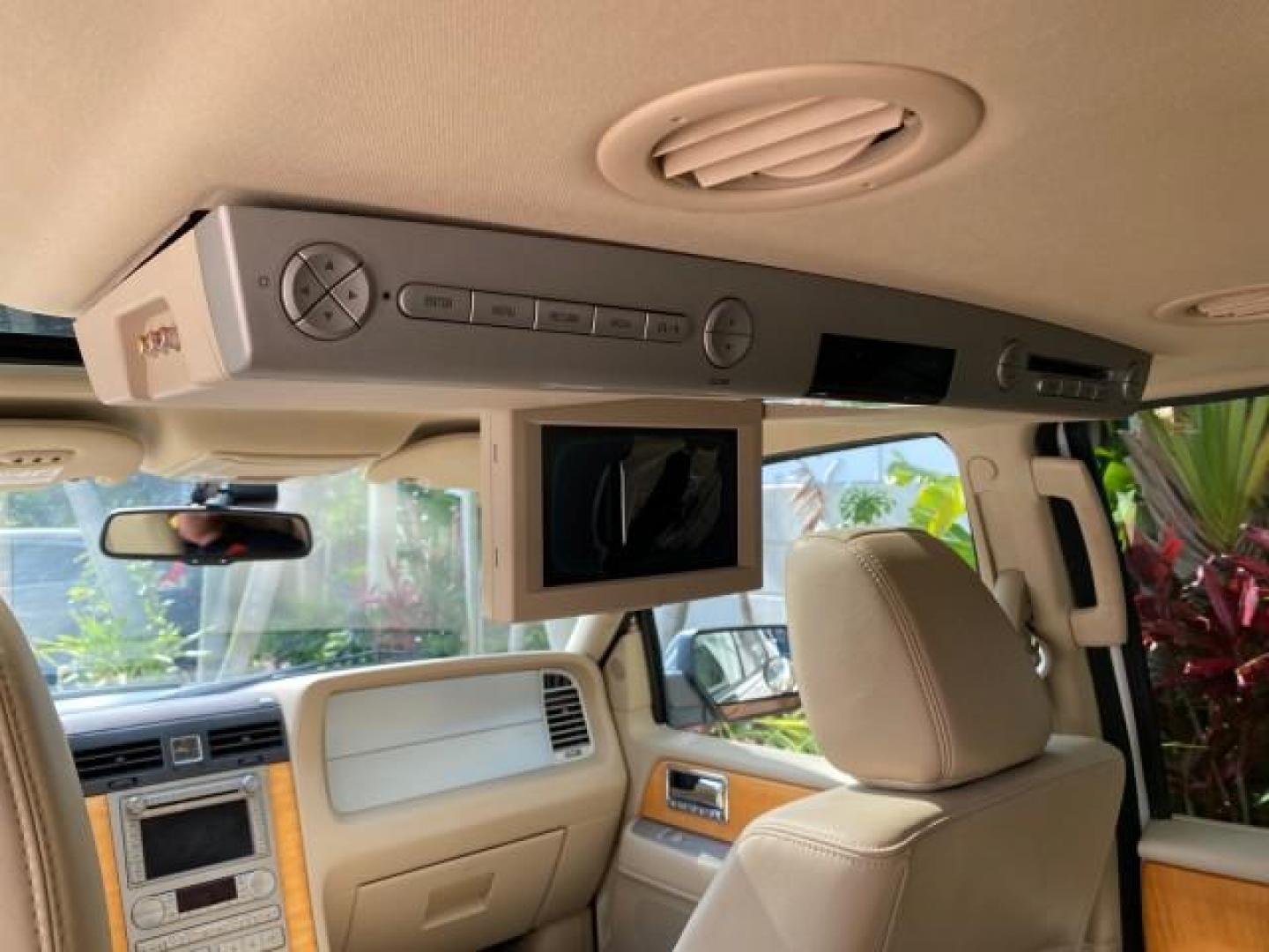 2010 White Platinum Tri-Coat Metallic /Camel Lincoln Navigator 4WD SUNROOF LOW MILES 31,209 (5LMJJ2J50AE) with an 5.4L SOHC 24-Valve V8 FFV Engine engine, Automatic transmission, located at 4701 North Dixie Hwy, Pompano Beach, FL, 33064, (954) 422-2889, 26.240938, -80.123474 - OUR WEBPAGE FLORIDACARS1.COM HAS OVER 100 PHOTOS AND FREE CARFAX LINK 2010 Lincoln Navigator 4 Door Wagon/Sport Utility 5.4L V8 F SOHC 24V Flex Fuel 18 MPG Rear Wheel Drive w/ 4X4 Features 20 Inch Plus Wheels 4WD/AWD A/C Seat(s) ABS Brakes Air Conditioning Alloy Wheels AM/FM Stereo Automatic Transmi- Photo#86