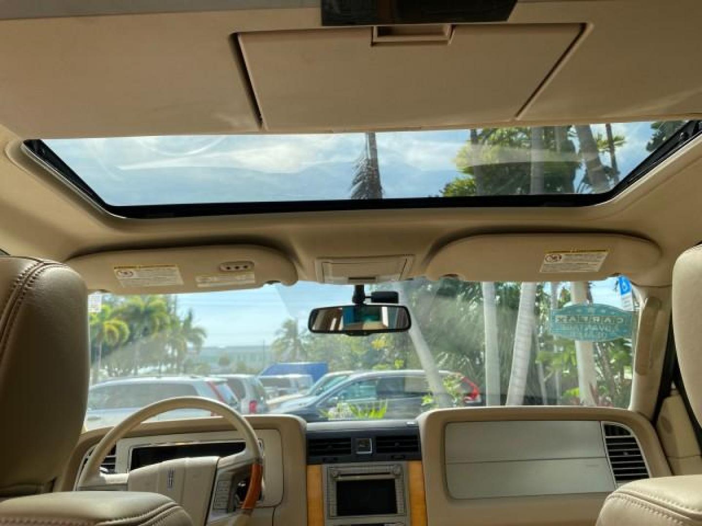 2010 White Platinum Tri-Coat Metallic /Camel Lincoln Navigator 4WD SUNROOF LOW MILES 31,209 (5LMJJ2J50AE) with an 5.4L SOHC 24-Valve V8 FFV Engine engine, Automatic transmission, located at 4701 North Dixie Hwy, Pompano Beach, FL, 33064, (954) 422-2889, 26.240938, -80.123474 - OUR WEBPAGE FLORIDACARS1.COM HAS OVER 100 PHOTOS AND FREE CARFAX LINK 2010 Lincoln Navigator 4 Door Wagon/Sport Utility 5.4L V8 F SOHC 24V Flex Fuel 18 MPG Rear Wheel Drive w/ 4X4 Features 20 Inch Plus Wheels 4WD/AWD A/C Seat(s) ABS Brakes Air Conditioning Alloy Wheels AM/FM Stereo Automatic Transmi- Photo#88
