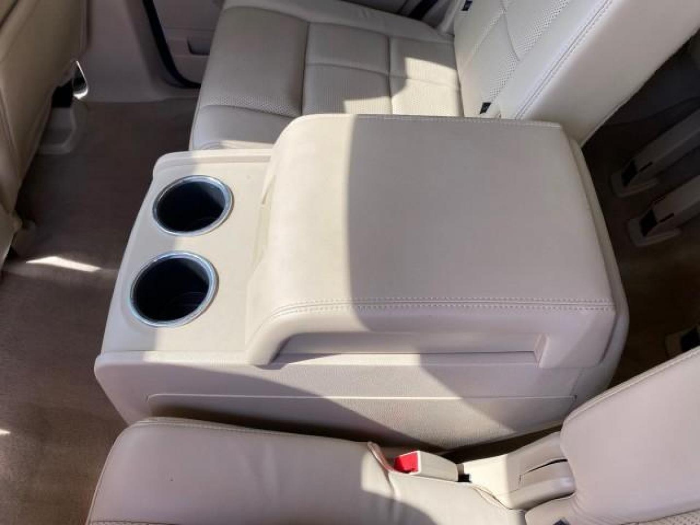 2010 White Platinum Tri-Coat Metallic /Camel Lincoln Navigator 4WD SUNROOF LOW MILES 31,209 (5LMJJ2J50AE) with an 5.4L SOHC 24-Valve V8 FFV Engine engine, Automatic transmission, located at 4701 North Dixie Hwy, Pompano Beach, FL, 33064, (954) 422-2889, 26.240938, -80.123474 - OUR WEBPAGE FLORIDACARS1.COM HAS OVER 100 PHOTOS AND FREE CARFAX LINK 2010 Lincoln Navigator 4 Door Wagon/Sport Utility 5.4L V8 F SOHC 24V Flex Fuel 18 MPG Rear Wheel Drive w/ 4X4 Features 20 Inch Plus Wheels 4WD/AWD A/C Seat(s) ABS Brakes Air Conditioning Alloy Wheels AM/FM Stereo Automatic Transmi- Photo#90