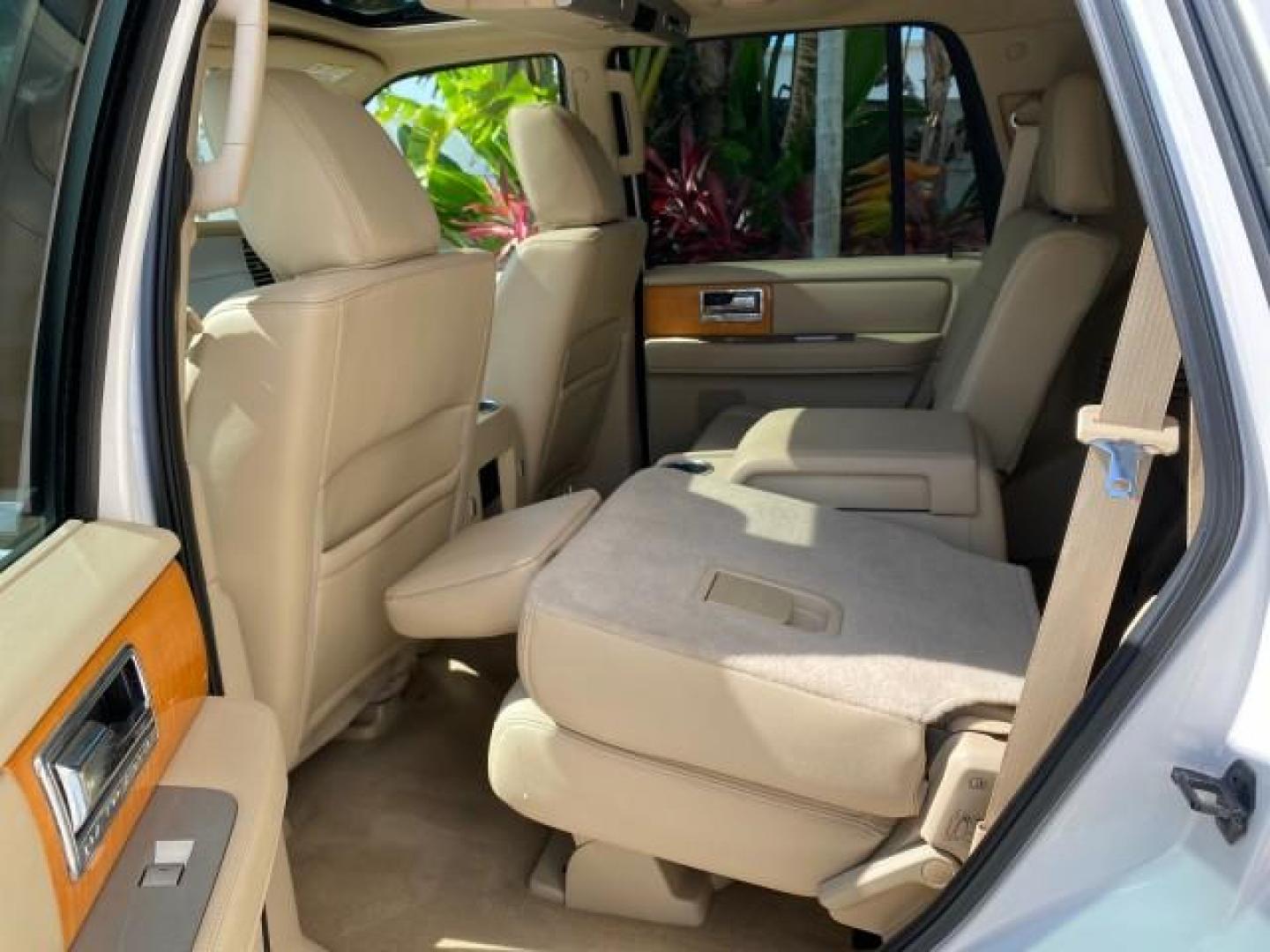 2010 White Platinum Tri-Coat Metallic /Camel Lincoln Navigator 4WD SUNROOF LOW MILES 31,209 (5LMJJ2J50AE) with an 5.4L SOHC 24-Valve V8 FFV Engine engine, Automatic transmission, located at 4701 North Dixie Hwy, Pompano Beach, FL, 33064, (954) 422-2889, 26.240938, -80.123474 - OUR WEBPAGE FLORIDACARS1.COM HAS OVER 100 PHOTOS AND FREE CARFAX LINK 2010 Lincoln Navigator 4 Door Wagon/Sport Utility 5.4L V8 F SOHC 24V Flex Fuel 18 MPG Rear Wheel Drive w/ 4X4 Features 20 Inch Plus Wheels 4WD/AWD A/C Seat(s) ABS Brakes Air Conditioning Alloy Wheels AM/FM Stereo Automatic Transmi- Photo#92