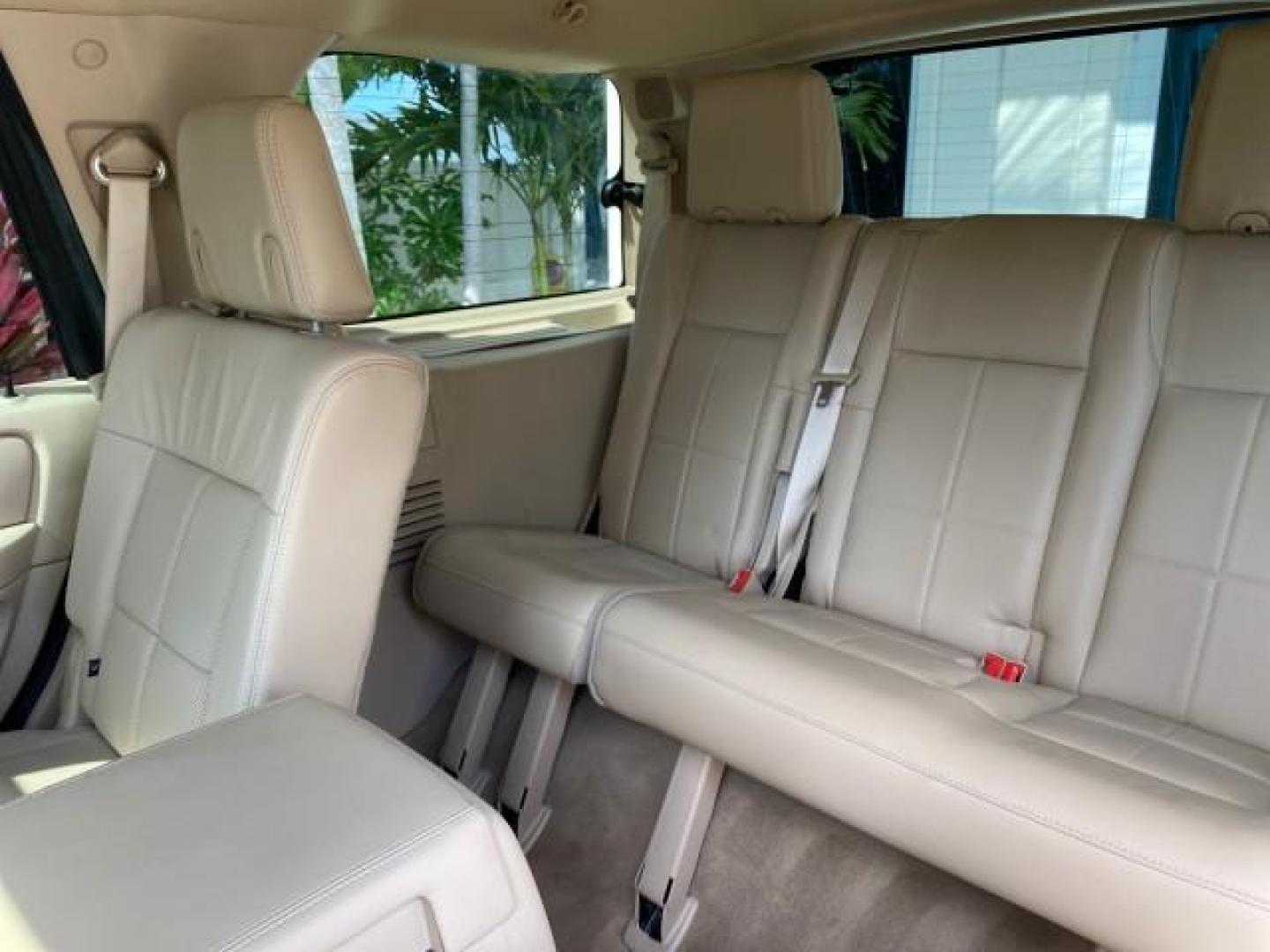 2010 White Platinum Tri-Coat Metallic /Camel Lincoln Navigator 4WD SUNROOF LOW MILES 31,209 (5LMJJ2J50AE) with an 5.4L SOHC 24-Valve V8 FFV Engine engine, Automatic transmission, located at 4701 North Dixie Hwy, Pompano Beach, FL, 33064, (954) 422-2889, 26.240938, -80.123474 - OUR WEBPAGE FLORIDACARS1.COM HAS OVER 100 PHOTOS AND FREE CARFAX LINK 2010 Lincoln Navigator 4 Door Wagon/Sport Utility 5.4L V8 F SOHC 24V Flex Fuel 18 MPG Rear Wheel Drive w/ 4X4 Features 20 Inch Plus Wheels 4WD/AWD A/C Seat(s) ABS Brakes Air Conditioning Alloy Wheels AM/FM Stereo Automatic Transmi- Photo#94