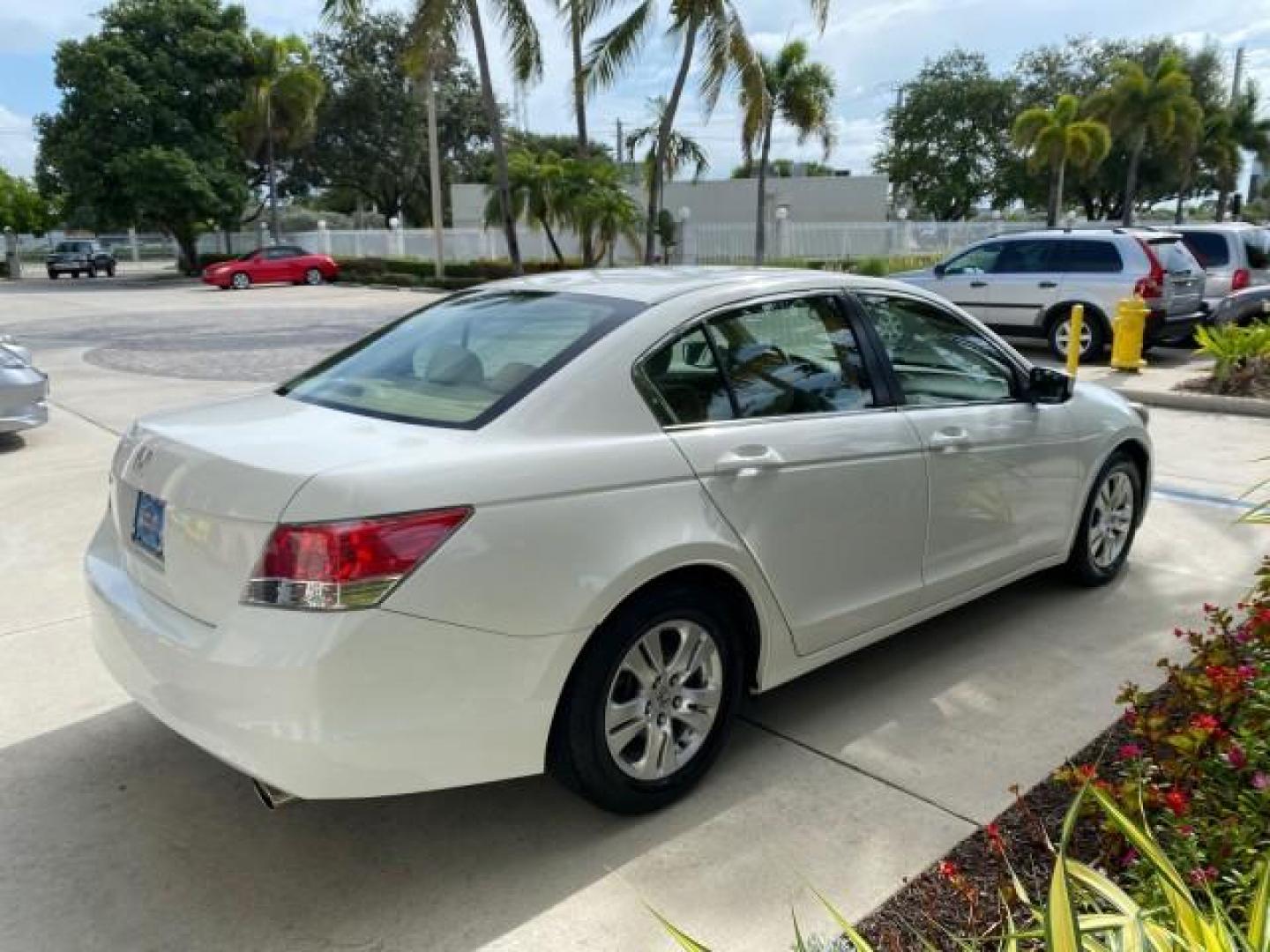 2008 Taffeta White /Ivory Honda Accord Sdn LX-P LOW MILES 49,816 1 OWNER (JHMCP26428C) with an 2.4L DOHC MPFI 16-Valve i-VTEC I4 Engine engine, Automatic transmission, located at 4701 North Dixie Hwy, Pompano Beach, FL, 33064, (954) 422-2889, 26.240938, -80.123474 - OUR WEBPAGE FLORIDACARS1.COM HAS OVER 100 PHOTOS AND FREE CARFAX LINK 2008 Honda Accord LX-P Sedan 4 DR 2.4L I4 F DOHC 16V Gasoline 31 MPG Front Wheel Drive Features ABS Brakes Air Conditioning Alloy Wheels AM/FM Stereo Automatic Transmission Auxiliary Audio Input CD Audio Cloth Seats Cruise Control- Photo#7