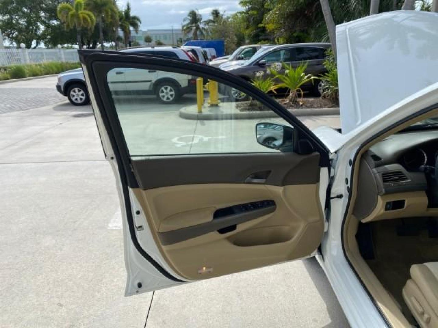2008 Taffeta White /Ivory Honda Accord Sdn LX-P LOW MILES 49,816 1 OWNER (JHMCP26428C) with an 2.4L DOHC MPFI 16-Valve i-VTEC I4 Engine engine, Automatic transmission, located at 4701 North Dixie Hwy, Pompano Beach, FL, 33064, (954) 422-2889, 26.240938, -80.123474 - OUR WEBPAGE FLORIDACARS1.COM HAS OVER 100 PHOTOS AND FREE CARFAX LINK 2008 Honda Accord LX-P Sedan 4 DR 2.4L I4 F DOHC 16V Gasoline 31 MPG Front Wheel Drive Features ABS Brakes Air Conditioning Alloy Wheels AM/FM Stereo Automatic Transmission Auxiliary Audio Input CD Audio Cloth Seats Cruise Control- Photo#9