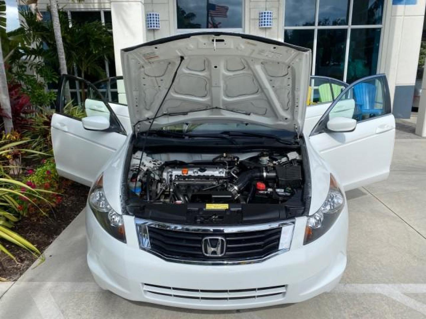 2008 Taffeta White /Ivory Honda Accord Sdn LX-P LOW MILES 49,816 1 OWNER (JHMCP26428C) with an 2.4L DOHC MPFI 16-Valve i-VTEC I4 Engine engine, Automatic transmission, located at 4701 North Dixie Hwy, Pompano Beach, FL, 33064, (954) 422-2889, 26.240938, -80.123474 - OUR WEBPAGE FLORIDACARS1.COM HAS OVER 100 PHOTOS AND FREE CARFAX LINK 2008 Honda Accord LX-P Sedan 4 DR 2.4L I4 F DOHC 16V Gasoline 31 MPG Front Wheel Drive Features ABS Brakes Air Conditioning Alloy Wheels AM/FM Stereo Automatic Transmission Auxiliary Audio Input CD Audio Cloth Seats Cruise Control- Photo#17