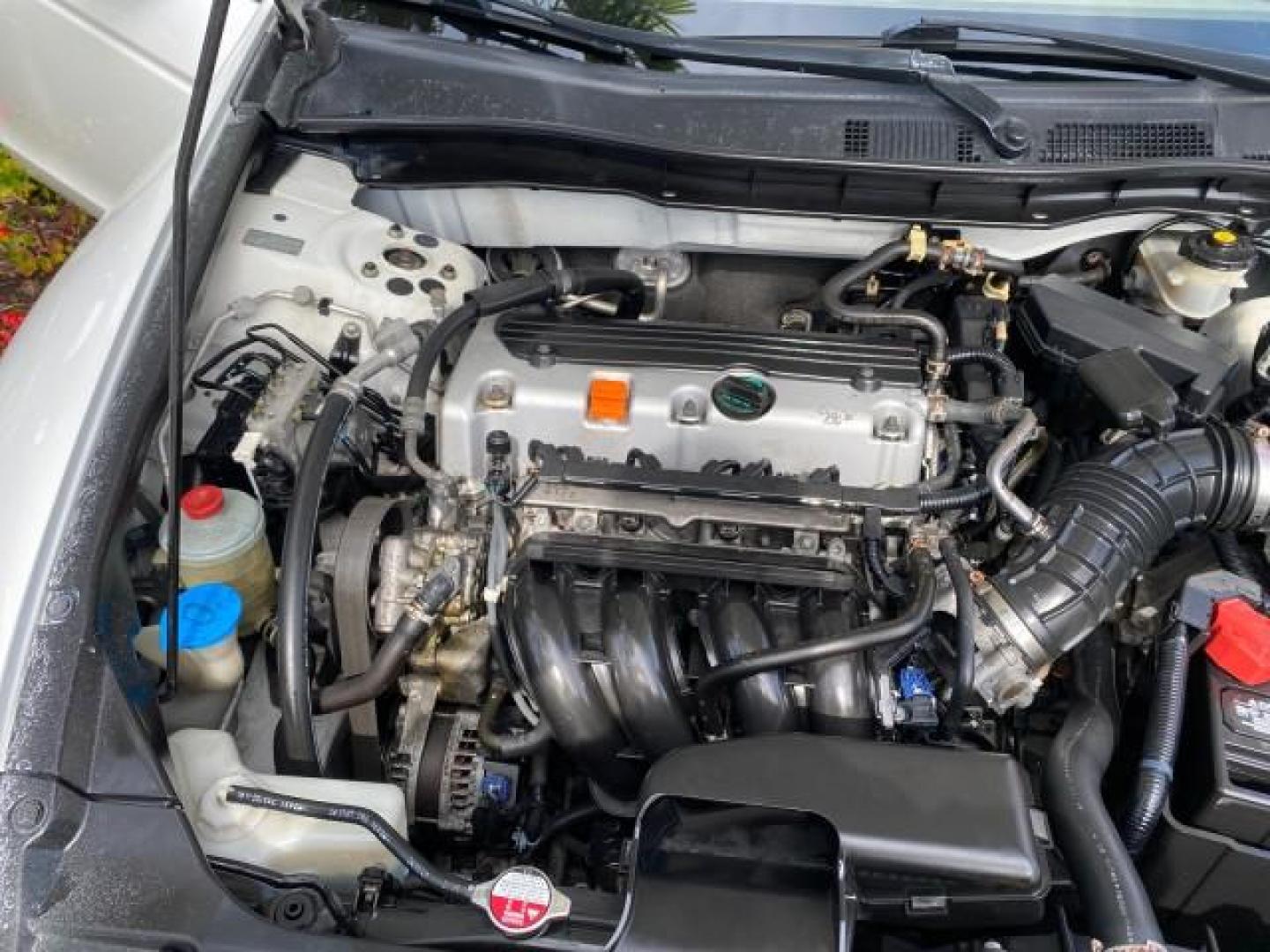 2008 Taffeta White /Ivory Honda Accord Sdn LX-P LOW MILES 49,816 1 OWNER (JHMCP26428C) with an 2.4L DOHC MPFI 16-Valve i-VTEC I4 Engine engine, Automatic transmission, located at 4701 North Dixie Hwy, Pompano Beach, FL, 33064, (954) 422-2889, 26.240938, -80.123474 - OUR WEBPAGE FLORIDACARS1.COM HAS OVER 100 PHOTOS AND FREE CARFAX LINK 2008 Honda Accord LX-P Sedan 4 DR 2.4L I4 F DOHC 16V Gasoline 31 MPG Front Wheel Drive Features ABS Brakes Air Conditioning Alloy Wheels AM/FM Stereo Automatic Transmission Auxiliary Audio Input CD Audio Cloth Seats Cruise Control- Photo#24