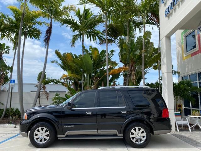 2004 Black /Light Parchment Lincoln Navigator LOW MILES 67,511 SUNROOF (5LMFU27R54L) with an 5.4L DOHC 32-Valve V8 Intech Engine engine, Automatic transmission, located at 4701 North Dixie Hwy, Pompano Beach, FL, 33064, (954) 422-2889, 26.240938, -80.123474 - OUR WEBPAGE FLORIDACARS1.COM HAS OVER 100 PHOTOS AND FREE CARFAX LINK 2004 Lincoln Navigator 4 Door Wagon/Sport Utility 5.4L V8 F DOHC Gasoline 17 MPG Rear Wheel Drive Features A/C Seat(s) ABS Brakes Air Conditioning Alloy Wheels AM/FM Stereo Automatic Transmission CD Audio Cruise Control Fold-Away- Photo#4