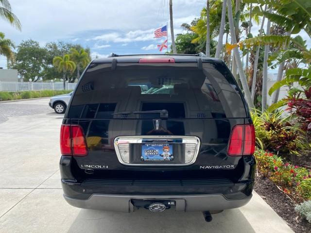 2004 Black /Light Parchment Lincoln Navigator LOW MILES 67,511 SUNROOF (5LMFU27R54L) with an 5.4L DOHC 32-Valve V8 Intech Engine engine, Automatic transmission, located at 4701 North Dixie Hwy, Pompano Beach, FL, 33064, (954) 422-2889, 26.240938, -80.123474 - OUR WEBPAGE FLORIDACARS1.COM HAS OVER 100 PHOTOS AND FREE CARFAX LINK 2004 Lincoln Navigator 4 Door Wagon/Sport Utility 5.4L V8 F DOHC Gasoline 17 MPG Rear Wheel Drive Features A/C Seat(s) ABS Brakes Air Conditioning Alloy Wheels AM/FM Stereo Automatic Transmission CD Audio Cruise Control Fold-Away- Photo#6
