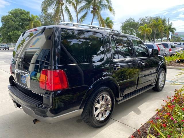 2004 Black /Light Parchment Lincoln Navigator LOW MILES 67,511 SUNROOF (5LMFU27R54L) with an 5.4L DOHC 32-Valve V8 Intech Engine engine, Automatic transmission, located at 4701 North Dixie Hwy, Pompano Beach, FL, 33064, (954) 422-2889, 26.240938, -80.123474 - OUR WEBPAGE FLORIDACARS1.COM HAS OVER 100 PHOTOS AND FREE CARFAX LINK 2004 Lincoln Navigator 4 Door Wagon/Sport Utility 5.4L V8 F DOHC Gasoline 17 MPG Rear Wheel Drive Features A/C Seat(s) ABS Brakes Air Conditioning Alloy Wheels AM/FM Stereo Automatic Transmission CD Audio Cruise Control Fold-Away- Photo#7
