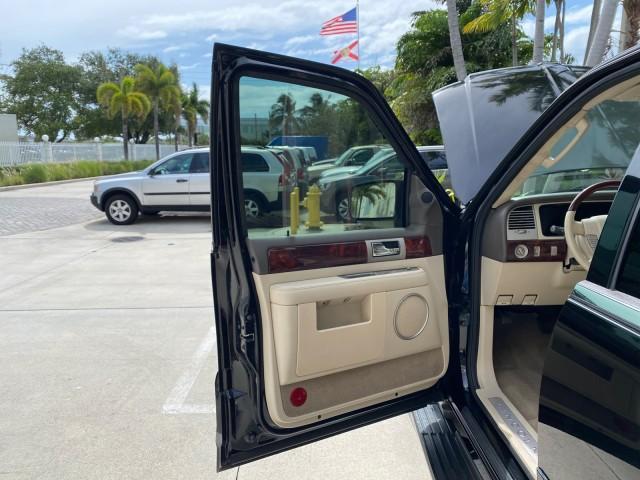 2004 Black /Light Parchment Lincoln Navigator LOW MILES 67,511 SUNROOF (5LMFU27R54L) with an 5.4L DOHC 32-Valve V8 Intech Engine engine, Automatic transmission, located at 4701 North Dixie Hwy, Pompano Beach, FL, 33064, (954) 422-2889, 26.240938, -80.123474 - OUR WEBPAGE FLORIDACARS1.COM HAS OVER 100 PHOTOS AND FREE CARFAX LINK 2004 Lincoln Navigator 4 Door Wagon/Sport Utility 5.4L V8 F DOHC Gasoline 17 MPG Rear Wheel Drive Features A/C Seat(s) ABS Brakes Air Conditioning Alloy Wheels AM/FM Stereo Automatic Transmission CD Audio Cruise Control Fold-Away- Photo#9