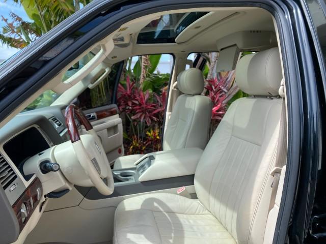 2004 Black /Light Parchment Lincoln Navigator LOW MILES 67,511 SUNROOF (5LMFU27R54L) with an 5.4L DOHC 32-Valve V8 Intech Engine engine, Automatic transmission, located at 4701 North Dixie Hwy, Pompano Beach, FL, 33064, (954) 422-2889, 26.240938, -80.123474 - OUR WEBPAGE FLORIDACARS1.COM HAS OVER 100 PHOTOS AND FREE CARFAX LINK 2004 Lincoln Navigator 4 Door Wagon/Sport Utility 5.4L V8 F DOHC Gasoline 17 MPG Rear Wheel Drive Features A/C Seat(s) ABS Brakes Air Conditioning Alloy Wheels AM/FM Stereo Automatic Transmission CD Audio Cruise Control Fold-Away- Photo#10