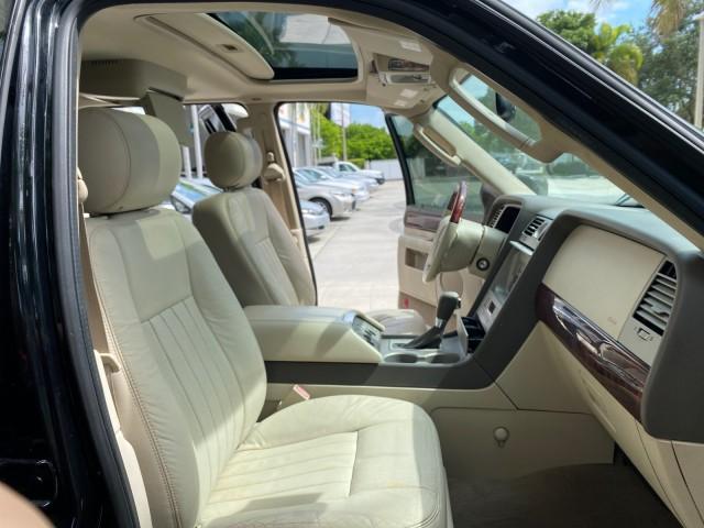 2004 Black /Light Parchment Lincoln Navigator LOW MILES 67,511 SUNROOF (5LMFU27R54L) with an 5.4L DOHC 32-Valve V8 Intech Engine engine, Automatic transmission, located at 4701 North Dixie Hwy, Pompano Beach, FL, 33064, (954) 422-2889, 26.240938, -80.123474 - OUR WEBPAGE FLORIDACARS1.COM HAS OVER 100 PHOTOS AND FREE CARFAX LINK 2004 Lincoln Navigator 4 Door Wagon/Sport Utility 5.4L V8 F DOHC Gasoline 17 MPG Rear Wheel Drive Features A/C Seat(s) ABS Brakes Air Conditioning Alloy Wheels AM/FM Stereo Automatic Transmission CD Audio Cruise Control Fold-Away- Photo#12