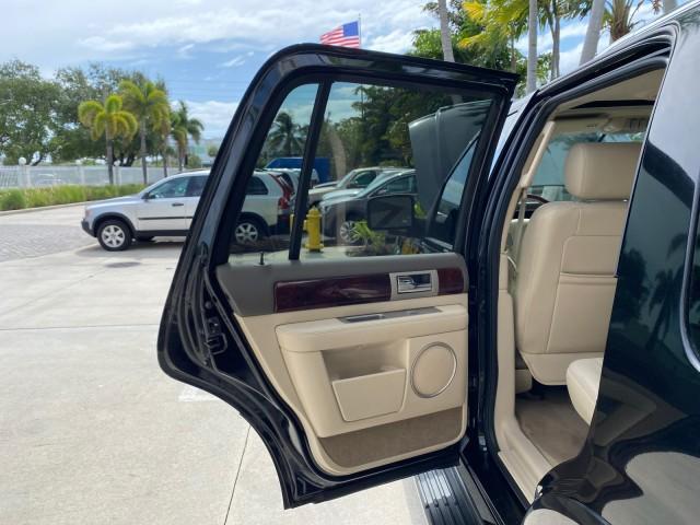 2004 Black /Light Parchment Lincoln Navigator LOW MILES 67,511 SUNROOF (5LMFU27R54L) with an 5.4L DOHC 32-Valve V8 Intech Engine engine, Automatic transmission, located at 4701 North Dixie Hwy, Pompano Beach, FL, 33064, (954) 422-2889, 26.240938, -80.123474 - OUR WEBPAGE FLORIDACARS1.COM HAS OVER 100 PHOTOS AND FREE CARFAX LINK 2004 Lincoln Navigator 4 Door Wagon/Sport Utility 5.4L V8 F DOHC Gasoline 17 MPG Rear Wheel Drive Features A/C Seat(s) ABS Brakes Air Conditioning Alloy Wheels AM/FM Stereo Automatic Transmission CD Audio Cruise Control Fold-Away- Photo#13