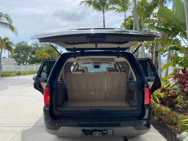 2004 Black /Light Parchment Lincoln Navigator LOW MILES 67,511 SUNROOF (5LMFU27R54L) with an 5.4L DOHC 32-Valve V8 Intech Engine engine, Automatic transmission, located at 4701 North Dixie Hwy, Pompano Beach, FL, 33064, (954) 422-2889, 26.240938, -80.123474 - OUR WEBPAGE FLORIDACARS1.COM HAS OVER 100 PHOTOS AND FREE CARFAX LINK 2004 Lincoln Navigator 4 Door Wagon/Sport Utility 5.4L V8 F DOHC Gasoline 17 MPG Rear Wheel Drive Features A/C Seat(s) ABS Brakes Air Conditioning Alloy Wheels AM/FM Stereo Automatic Transmission CD Audio Cruise Control Fold-Away- Photo#15