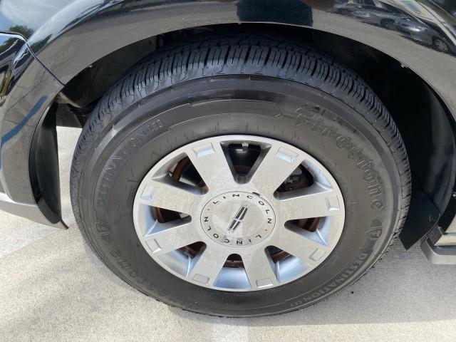 2004 Black /Light Parchment Lincoln Navigator LOW MILES 67,511 SUNROOF (5LMFU27R54L) with an 5.4L DOHC 32-Valve V8 Intech Engine engine, Automatic transmission, located at 4701 North Dixie Hwy, Pompano Beach, FL, 33064, (954) 422-2889, 26.240938, -80.123474 - OUR WEBPAGE FLORIDACARS1.COM HAS OVER 100 PHOTOS AND FREE CARFAX LINK 2004 Lincoln Navigator 4 Door Wagon/Sport Utility 5.4L V8 F DOHC Gasoline 17 MPG Rear Wheel Drive Features A/C Seat(s) ABS Brakes Air Conditioning Alloy Wheels AM/FM Stereo Automatic Transmission CD Audio Cruise Control Fold-Away- Photo#19