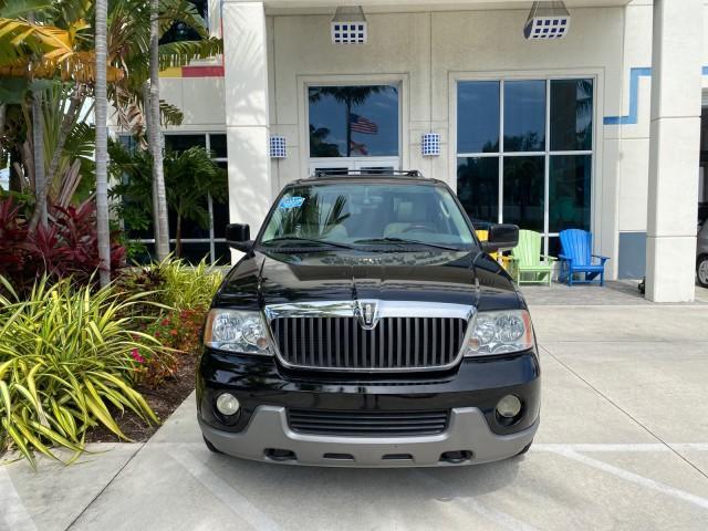 2004 Black /Light Parchment Lincoln Navigator LOW MILES 67,511 SUNROOF (5LMFU27R54L) with an 5.4L DOHC 32-Valve V8 Intech Engine engine, Automatic transmission, located at 4701 North Dixie Hwy, Pompano Beach, FL, 33064, (954) 422-2889, 26.240938, -80.123474 - OUR WEBPAGE FLORIDACARS1.COM HAS OVER 100 PHOTOS AND FREE CARFAX LINK 2004 Lincoln Navigator 4 Door Wagon/Sport Utility 5.4L V8 F DOHC Gasoline 17 MPG Rear Wheel Drive Features A/C Seat(s) ABS Brakes Air Conditioning Alloy Wheels AM/FM Stereo Automatic Transmission CD Audio Cruise Control Fold-Away- Photo#24