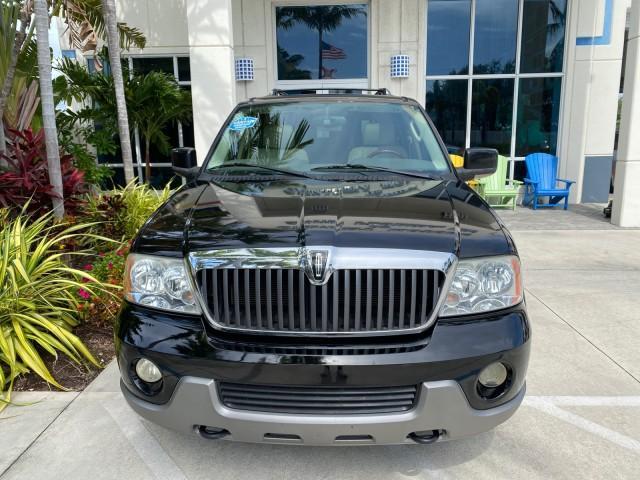 2004 Black /Light Parchment Lincoln Navigator LOW MILES 67,511 SUNROOF (5LMFU27R54L) with an 5.4L DOHC 32-Valve V8 Intech Engine engine, Automatic transmission, located at 4701 North Dixie Hwy, Pompano Beach, FL, 33064, (954) 422-2889, 26.240938, -80.123474 - OUR WEBPAGE FLORIDACARS1.COM HAS OVER 100 PHOTOS AND FREE CARFAX LINK 2004 Lincoln Navigator 4 Door Wagon/Sport Utility 5.4L V8 F DOHC Gasoline 17 MPG Rear Wheel Drive Features A/C Seat(s) ABS Brakes Air Conditioning Alloy Wheels AM/FM Stereo Automatic Transmission CD Audio Cruise Control Fold-Away- Photo#25