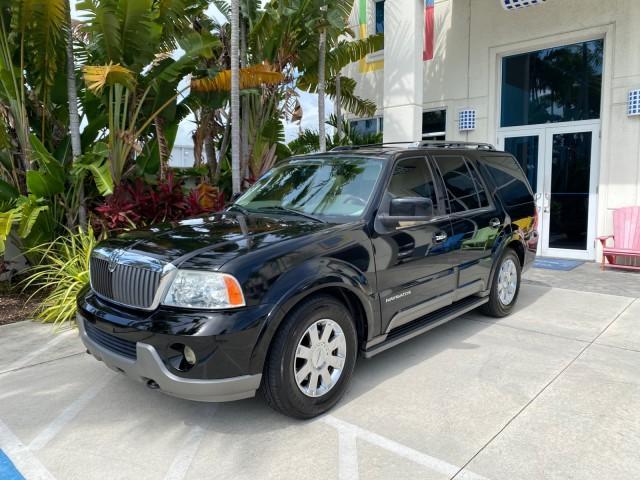 2004 Black /Light Parchment Lincoln Navigator LOW MILES 67,511 SUNROOF (5LMFU27R54L) with an 5.4L DOHC 32-Valve V8 Intech Engine engine, Automatic transmission, located at 4701 North Dixie Hwy, Pompano Beach, FL, 33064, (954) 422-2889, 26.240938, -80.123474 - OUR WEBPAGE FLORIDACARS1.COM HAS OVER 100 PHOTOS AND FREE CARFAX LINK 2004 Lincoln Navigator 4 Door Wagon/Sport Utility 5.4L V8 F DOHC Gasoline 17 MPG Rear Wheel Drive Features A/C Seat(s) ABS Brakes Air Conditioning Alloy Wheels AM/FM Stereo Automatic Transmission CD Audio Cruise Control Fold-Away- Photo#26