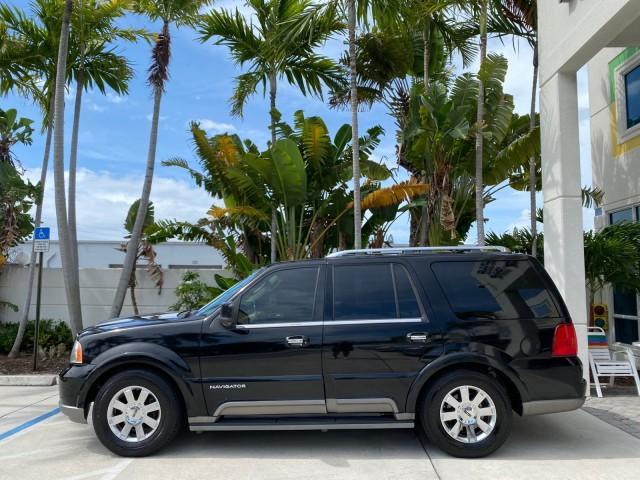 2004 Black /Light Parchment Lincoln Navigator LOW MILES 67,511 SUNROOF (5LMFU27R54L) with an 5.4L DOHC 32-Valve V8 Intech Engine engine, Automatic transmission, located at 4701 North Dixie Hwy, Pompano Beach, FL, 33064, (954) 422-2889, 26.240938, -80.123474 - OUR WEBPAGE FLORIDACARS1.COM HAS OVER 100 PHOTOS AND FREE CARFAX LINK 2004 Lincoln Navigator 4 Door Wagon/Sport Utility 5.4L V8 F DOHC Gasoline 17 MPG Rear Wheel Drive Features A/C Seat(s) ABS Brakes Air Conditioning Alloy Wheels AM/FM Stereo Automatic Transmission CD Audio Cruise Control Fold-Away- Photo#28