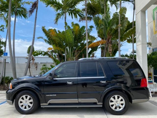 2004 Black /Light Parchment Lincoln Navigator LOW MILES 67,511 SUNROOF (5LMFU27R54L) with an 5.4L DOHC 32-Valve V8 Intech Engine engine, Automatic transmission, located at 4701 North Dixie Hwy, Pompano Beach, FL, 33064, (954) 422-2889, 26.240938, -80.123474 - OUR WEBPAGE FLORIDACARS1.COM HAS OVER 100 PHOTOS AND FREE CARFAX LINK 2004 Lincoln Navigator 4 Door Wagon/Sport Utility 5.4L V8 F DOHC Gasoline 17 MPG Rear Wheel Drive Features A/C Seat(s) ABS Brakes Air Conditioning Alloy Wheels AM/FM Stereo Automatic Transmission CD Audio Cruise Control Fold-Away- Photo#29