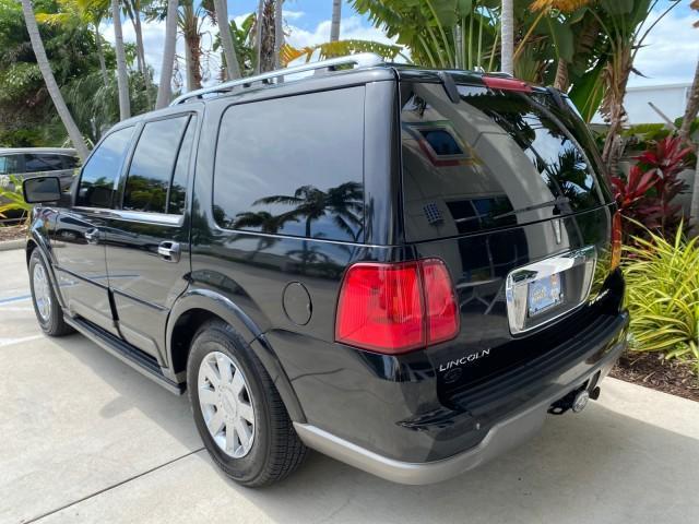2004 Black /Light Parchment Lincoln Navigator LOW MILES 67,511 SUNROOF (5LMFU27R54L) with an 5.4L DOHC 32-Valve V8 Intech Engine engine, Automatic transmission, located at 4701 North Dixie Hwy, Pompano Beach, FL, 33064, (954) 422-2889, 26.240938, -80.123474 - OUR WEBPAGE FLORIDACARS1.COM HAS OVER 100 PHOTOS AND FREE CARFAX LINK 2004 Lincoln Navigator 4 Door Wagon/Sport Utility 5.4L V8 F DOHC Gasoline 17 MPG Rear Wheel Drive Features A/C Seat(s) ABS Brakes Air Conditioning Alloy Wheels AM/FM Stereo Automatic Transmission CD Audio Cruise Control Fold-Away- Photo#31