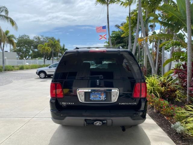 2004 Black /Light Parchment Lincoln Navigator LOW MILES 67,511 SUNROOF (5LMFU27R54L) with an 5.4L DOHC 32-Valve V8 Intech Engine engine, Automatic transmission, located at 4701 North Dixie Hwy, Pompano Beach, FL, 33064, (954) 422-2889, 26.240938, -80.123474 - OUR WEBPAGE FLORIDACARS1.COM HAS OVER 100 PHOTOS AND FREE CARFAX LINK 2004 Lincoln Navigator 4 Door Wagon/Sport Utility 5.4L V8 F DOHC Gasoline 17 MPG Rear Wheel Drive Features A/C Seat(s) ABS Brakes Air Conditioning Alloy Wheels AM/FM Stereo Automatic Transmission CD Audio Cruise Control Fold-Away- Photo#32