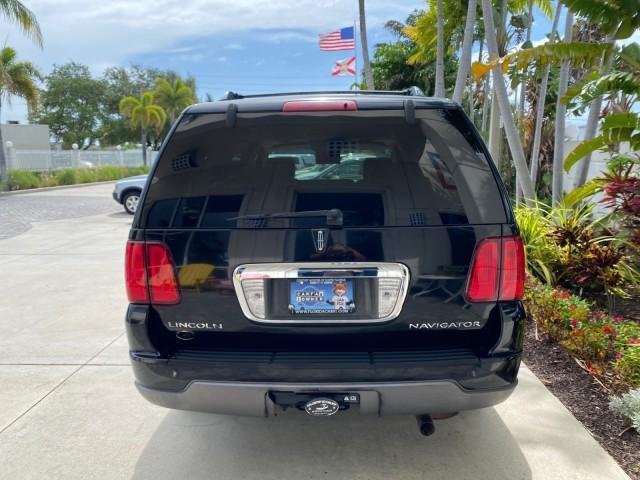 2004 Black /Light Parchment Lincoln Navigator LOW MILES 67,511 SUNROOF (5LMFU27R54L) with an 5.4L DOHC 32-Valve V8 Intech Engine engine, Automatic transmission, located at 4701 North Dixie Hwy, Pompano Beach, FL, 33064, (954) 422-2889, 26.240938, -80.123474 - OUR WEBPAGE FLORIDACARS1.COM HAS OVER 100 PHOTOS AND FREE CARFAX LINK 2004 Lincoln Navigator 4 Door Wagon/Sport Utility 5.4L V8 F DOHC Gasoline 17 MPG Rear Wheel Drive Features A/C Seat(s) ABS Brakes Air Conditioning Alloy Wheels AM/FM Stereo Automatic Transmission CD Audio Cruise Control Fold-Away- Photo#33
