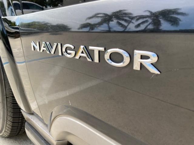 2004 Black /Light Parchment Lincoln Navigator LOW MILES 67,511 SUNROOF (5LMFU27R54L) with an 5.4L DOHC 32-Valve V8 Intech Engine engine, Automatic transmission, located at 4701 North Dixie Hwy, Pompano Beach, FL, 33064, (954) 422-2889, 26.240938, -80.123474 - OUR WEBPAGE FLORIDACARS1.COM HAS OVER 100 PHOTOS AND FREE CARFAX LINK 2004 Lincoln Navigator 4 Door Wagon/Sport Utility 5.4L V8 F DOHC Gasoline 17 MPG Rear Wheel Drive Features A/C Seat(s) ABS Brakes Air Conditioning Alloy Wheels AM/FM Stereo Automatic Transmission CD Audio Cruise Control Fold-Away- Photo#39