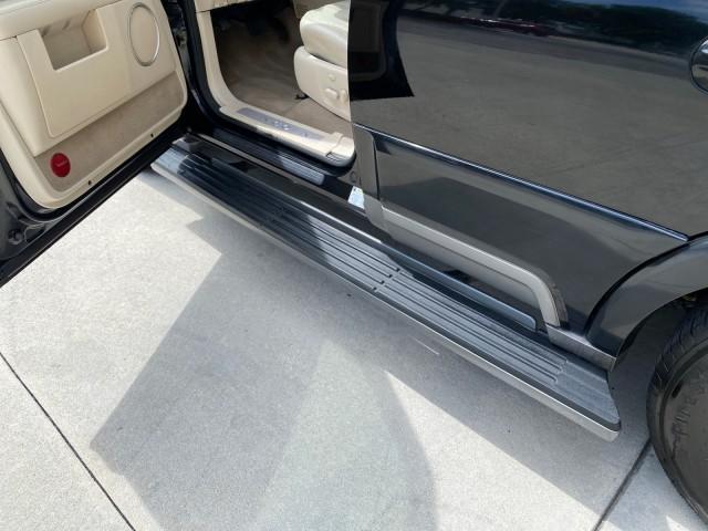 2004 Black /Light Parchment Lincoln Navigator LOW MILES 67,511 SUNROOF (5LMFU27R54L) with an 5.4L DOHC 32-Valve V8 Intech Engine engine, Automatic transmission, located at 4701 North Dixie Hwy, Pompano Beach, FL, 33064, (954) 422-2889, 26.240938, -80.123474 - OUR WEBPAGE FLORIDACARS1.COM HAS OVER 100 PHOTOS AND FREE CARFAX LINK 2004 Lincoln Navigator 4 Door Wagon/Sport Utility 5.4L V8 F DOHC Gasoline 17 MPG Rear Wheel Drive Features A/C Seat(s) ABS Brakes Air Conditioning Alloy Wheels AM/FM Stereo Automatic Transmission CD Audio Cruise Control Fold-Away- Photo#40