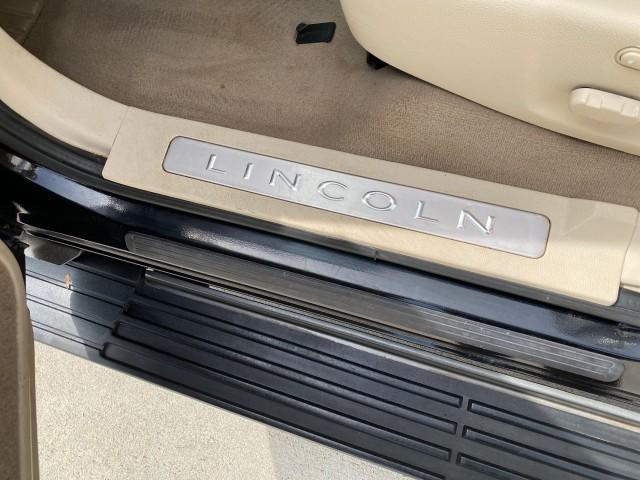 2004 Black /Light Parchment Lincoln Navigator LOW MILES 67,511 SUNROOF (5LMFU27R54L) with an 5.4L DOHC 32-Valve V8 Intech Engine engine, Automatic transmission, located at 4701 North Dixie Hwy, Pompano Beach, FL, 33064, (954) 422-2889, 26.240938, -80.123474 - OUR WEBPAGE FLORIDACARS1.COM HAS OVER 100 PHOTOS AND FREE CARFAX LINK 2004 Lincoln Navigator 4 Door Wagon/Sport Utility 5.4L V8 F DOHC Gasoline 17 MPG Rear Wheel Drive Features A/C Seat(s) ABS Brakes Air Conditioning Alloy Wheels AM/FM Stereo Automatic Transmission CD Audio Cruise Control Fold-Away- Photo#42