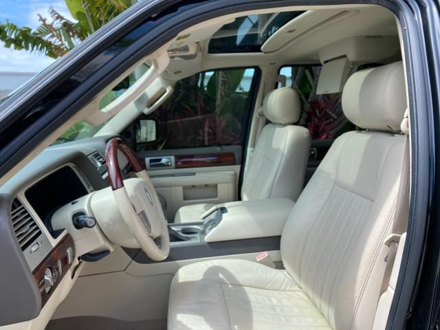 2004 Black /Light Parchment Lincoln Navigator LOW MILES 67,511 SUNROOF (5LMFU27R54L) with an 5.4L DOHC 32-Valve V8 Intech Engine engine, Automatic transmission, located at 4701 North Dixie Hwy, Pompano Beach, FL, 33064, (954) 422-2889, 26.240938, -80.123474 - OUR WEBPAGE FLORIDACARS1.COM HAS OVER 100 PHOTOS AND FREE CARFAX LINK 2004 Lincoln Navigator 4 Door Wagon/Sport Utility 5.4L V8 F DOHC Gasoline 17 MPG Rear Wheel Drive Features A/C Seat(s) ABS Brakes Air Conditioning Alloy Wheels AM/FM Stereo Automatic Transmission CD Audio Cruise Control Fold-Away- Photo#43