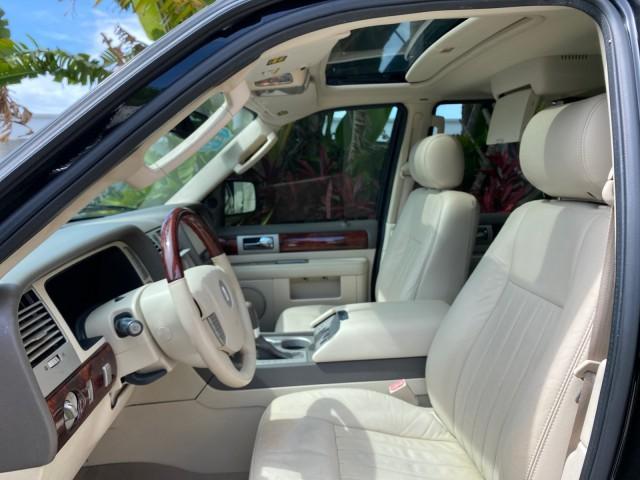 2004 Black /Light Parchment Lincoln Navigator LOW MILES 67,511 SUNROOF (5LMFU27R54L) with an 5.4L DOHC 32-Valve V8 Intech Engine engine, Automatic transmission, located at 4701 North Dixie Hwy, Pompano Beach, FL, 33064, (954) 422-2889, 26.240938, -80.123474 - OUR WEBPAGE FLORIDACARS1.COM HAS OVER 100 PHOTOS AND FREE CARFAX LINK 2004 Lincoln Navigator 4 Door Wagon/Sport Utility 5.4L V8 F DOHC Gasoline 17 MPG Rear Wheel Drive Features A/C Seat(s) ABS Brakes Air Conditioning Alloy Wheels AM/FM Stereo Automatic Transmission CD Audio Cruise Control Fold-Away- Photo#44