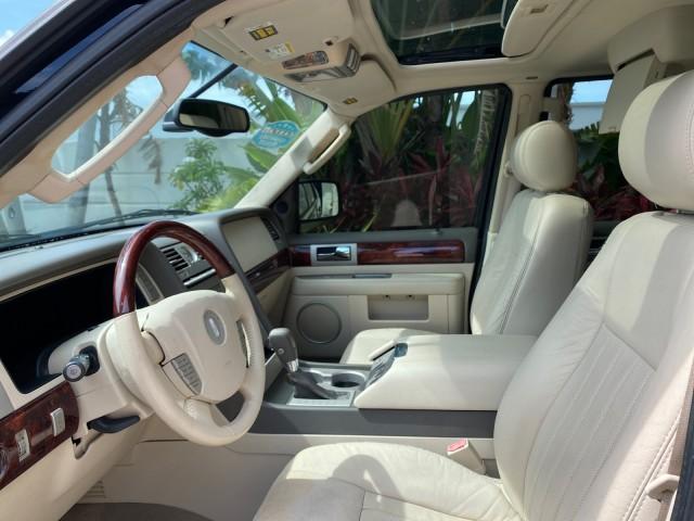 2004 Black /Light Parchment Lincoln Navigator LOW MILES 67,511 SUNROOF (5LMFU27R54L) with an 5.4L DOHC 32-Valve V8 Intech Engine engine, Automatic transmission, located at 4701 North Dixie Hwy, Pompano Beach, FL, 33064, (954) 422-2889, 26.240938, -80.123474 - OUR WEBPAGE FLORIDACARS1.COM HAS OVER 100 PHOTOS AND FREE CARFAX LINK 2004 Lincoln Navigator 4 Door Wagon/Sport Utility 5.4L V8 F DOHC Gasoline 17 MPG Rear Wheel Drive Features A/C Seat(s) ABS Brakes Air Conditioning Alloy Wheels AM/FM Stereo Automatic Transmission CD Audio Cruise Control Fold-Away- Photo#45
