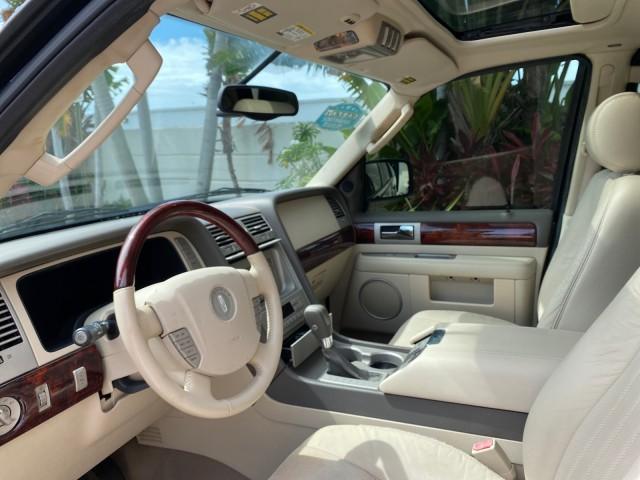 2004 Black /Light Parchment Lincoln Navigator LOW MILES 67,511 SUNROOF (5LMFU27R54L) with an 5.4L DOHC 32-Valve V8 Intech Engine engine, Automatic transmission, located at 4701 North Dixie Hwy, Pompano Beach, FL, 33064, (954) 422-2889, 26.240938, -80.123474 - OUR WEBPAGE FLORIDACARS1.COM HAS OVER 100 PHOTOS AND FREE CARFAX LINK 2004 Lincoln Navigator 4 Door Wagon/Sport Utility 5.4L V8 F DOHC Gasoline 17 MPG Rear Wheel Drive Features A/C Seat(s) ABS Brakes Air Conditioning Alloy Wheels AM/FM Stereo Automatic Transmission CD Audio Cruise Control Fold-Away- Photo#46