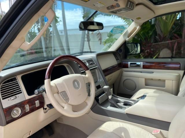 2004 Black /Light Parchment Lincoln Navigator LOW MILES 67,511 SUNROOF (5LMFU27R54L) with an 5.4L DOHC 32-Valve V8 Intech Engine engine, Automatic transmission, located at 4701 North Dixie Hwy, Pompano Beach, FL, 33064, (954) 422-2889, 26.240938, -80.123474 - OUR WEBPAGE FLORIDACARS1.COM HAS OVER 100 PHOTOS AND FREE CARFAX LINK 2004 Lincoln Navigator 4 Door Wagon/Sport Utility 5.4L V8 F DOHC Gasoline 17 MPG Rear Wheel Drive Features A/C Seat(s) ABS Brakes Air Conditioning Alloy Wheels AM/FM Stereo Automatic Transmission CD Audio Cruise Control Fold-Away- Photo#47