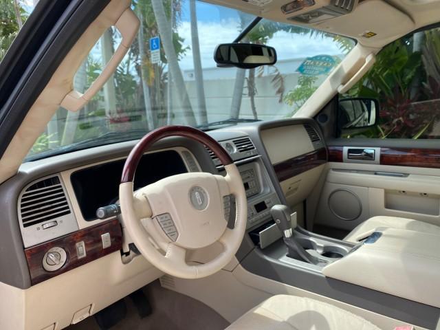 2004 Black /Light Parchment Lincoln Navigator LOW MILES 67,511 SUNROOF (5LMFU27R54L) with an 5.4L DOHC 32-Valve V8 Intech Engine engine, Automatic transmission, located at 4701 North Dixie Hwy, Pompano Beach, FL, 33064, (954) 422-2889, 26.240938, -80.123474 - OUR WEBPAGE FLORIDACARS1.COM HAS OVER 100 PHOTOS AND FREE CARFAX LINK 2004 Lincoln Navigator 4 Door Wagon/Sport Utility 5.4L V8 F DOHC Gasoline 17 MPG Rear Wheel Drive Features A/C Seat(s) ABS Brakes Air Conditioning Alloy Wheels AM/FM Stereo Automatic Transmission CD Audio Cruise Control Fold-Away- Photo#48