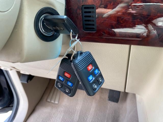2004 Black /Light Parchment Lincoln Navigator LOW MILES 67,511 SUNROOF (5LMFU27R54L) with an 5.4L DOHC 32-Valve V8 Intech Engine engine, Automatic transmission, located at 4701 North Dixie Hwy, Pompano Beach, FL, 33064, (954) 422-2889, 26.240938, -80.123474 - OUR WEBPAGE FLORIDACARS1.COM HAS OVER 100 PHOTOS AND FREE CARFAX LINK 2004 Lincoln Navigator 4 Door Wagon/Sport Utility 5.4L V8 F DOHC Gasoline 17 MPG Rear Wheel Drive Features A/C Seat(s) ABS Brakes Air Conditioning Alloy Wheels AM/FM Stereo Automatic Transmission CD Audio Cruise Control Fold-Away- Photo#55