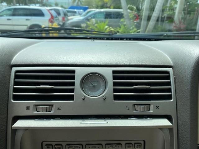 2004 Black /Light Parchment Lincoln Navigator LOW MILES 67,511 SUNROOF (5LMFU27R54L) with an 5.4L DOHC 32-Valve V8 Intech Engine engine, Automatic transmission, located at 4701 North Dixie Hwy, Pompano Beach, FL, 33064, (954) 422-2889, 26.240938, -80.123474 - OUR WEBPAGE FLORIDACARS1.COM HAS OVER 100 PHOTOS AND FREE CARFAX LINK 2004 Lincoln Navigator 4 Door Wagon/Sport Utility 5.4L V8 F DOHC Gasoline 17 MPG Rear Wheel Drive Features A/C Seat(s) ABS Brakes Air Conditioning Alloy Wheels AM/FM Stereo Automatic Transmission CD Audio Cruise Control Fold-Away- Photo#56