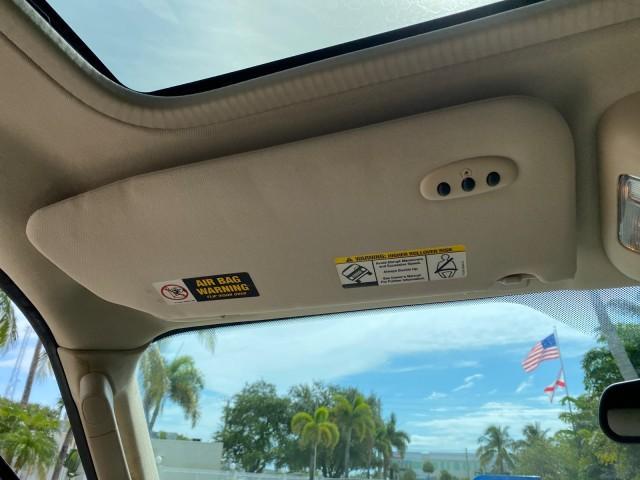 2004 Black /Light Parchment Lincoln Navigator LOW MILES 67,511 SUNROOF (5LMFU27R54L) with an 5.4L DOHC 32-Valve V8 Intech Engine engine, Automatic transmission, located at 4701 North Dixie Hwy, Pompano Beach, FL, 33064, (954) 422-2889, 26.240938, -80.123474 - OUR WEBPAGE FLORIDACARS1.COM HAS OVER 100 PHOTOS AND FREE CARFAX LINK 2004 Lincoln Navigator 4 Door Wagon/Sport Utility 5.4L V8 F DOHC Gasoline 17 MPG Rear Wheel Drive Features A/C Seat(s) ABS Brakes Air Conditioning Alloy Wheels AM/FM Stereo Automatic Transmission CD Audio Cruise Control Fold-Away- Photo#62