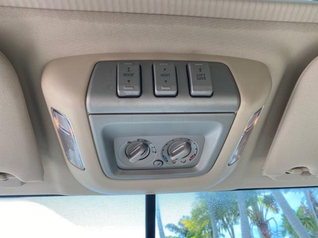 2004 Black /Light Parchment Lincoln Navigator LOW MILES 67,511 SUNROOF (5LMFU27R54L) with an 5.4L DOHC 32-Valve V8 Intech Engine engine, Automatic transmission, located at 4701 North Dixie Hwy, Pompano Beach, FL, 33064, (954) 422-2889, 26.240938, -80.123474 - OUR WEBPAGE FLORIDACARS1.COM HAS OVER 100 PHOTOS AND FREE CARFAX LINK 2004 Lincoln Navigator 4 Door Wagon/Sport Utility 5.4L V8 F DOHC Gasoline 17 MPG Rear Wheel Drive Features A/C Seat(s) ABS Brakes Air Conditioning Alloy Wheels AM/FM Stereo Automatic Transmission CD Audio Cruise Control Fold-Away- Photo#64