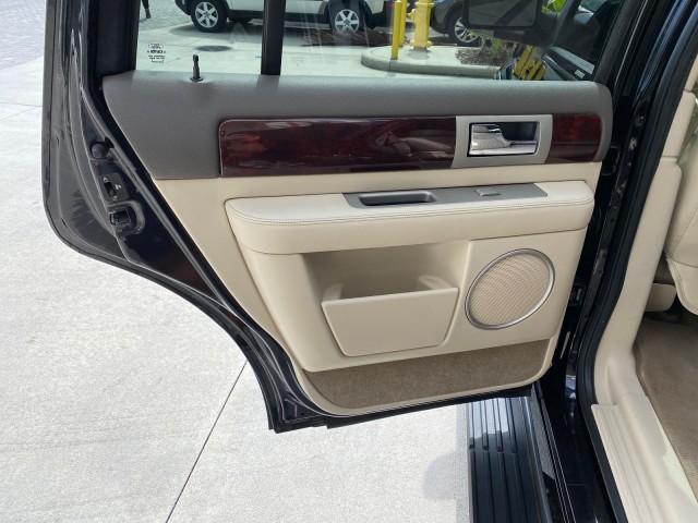 2004 Black /Light Parchment Lincoln Navigator LOW MILES 67,511 SUNROOF (5LMFU27R54L) with an 5.4L DOHC 32-Valve V8 Intech Engine engine, Automatic transmission, located at 4701 North Dixie Hwy, Pompano Beach, FL, 33064, (954) 422-2889, 26.240938, -80.123474 - OUR WEBPAGE FLORIDACARS1.COM HAS OVER 100 PHOTOS AND FREE CARFAX LINK 2004 Lincoln Navigator 4 Door Wagon/Sport Utility 5.4L V8 F DOHC Gasoline 17 MPG Rear Wheel Drive Features A/C Seat(s) ABS Brakes Air Conditioning Alloy Wheels AM/FM Stereo Automatic Transmission CD Audio Cruise Control Fold-Away- Photo#76
