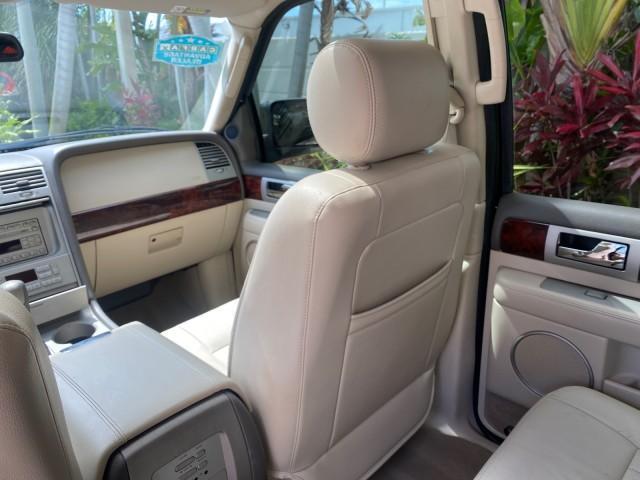 2004 Black /Light Parchment Lincoln Navigator LOW MILES 67,511 SUNROOF (5LMFU27R54L) with an 5.4L DOHC 32-Valve V8 Intech Engine engine, Automatic transmission, located at 4701 North Dixie Hwy, Pompano Beach, FL, 33064, (954) 422-2889, 26.240938, -80.123474 - OUR WEBPAGE FLORIDACARS1.COM HAS OVER 100 PHOTOS AND FREE CARFAX LINK 2004 Lincoln Navigator 4 Door Wagon/Sport Utility 5.4L V8 F DOHC Gasoline 17 MPG Rear Wheel Drive Features A/C Seat(s) ABS Brakes Air Conditioning Alloy Wheels AM/FM Stereo Automatic Transmission CD Audio Cruise Control Fold-Away- Photo#83