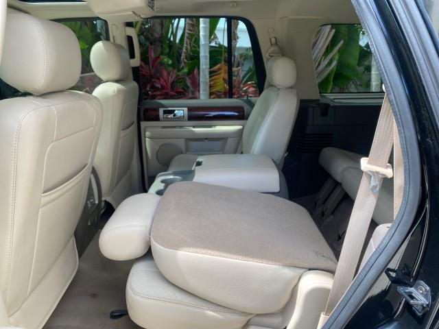 2004 Black /Light Parchment Lincoln Navigator LOW MILES 67,511 SUNROOF (5LMFU27R54L) with an 5.4L DOHC 32-Valve V8 Intech Engine engine, Automatic transmission, located at 4701 North Dixie Hwy, Pompano Beach, FL, 33064, (954) 422-2889, 26.240938, -80.123474 - OUR WEBPAGE FLORIDACARS1.COM HAS OVER 100 PHOTOS AND FREE CARFAX LINK 2004 Lincoln Navigator 4 Door Wagon/Sport Utility 5.4L V8 F DOHC Gasoline 17 MPG Rear Wheel Drive Features A/C Seat(s) ABS Brakes Air Conditioning Alloy Wheels AM/FM Stereo Automatic Transmission CD Audio Cruise Control Fold-Away- Photo#87