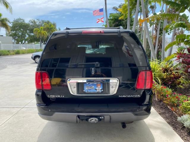 2004 Black /Light Parchment Lincoln Navigator LOW MILES 67,511 SUNROOF (5LMFU27R54L) with an 5.4L DOHC 32-Valve V8 Intech Engine engine, Automatic transmission, located at 4701 North Dixie Hwy, Pompano Beach, FL, 33064, (954) 422-2889, 26.240938, -80.123474 - OUR WEBPAGE FLORIDACARS1.COM HAS OVER 100 PHOTOS AND FREE CARFAX LINK 2004 Lincoln Navigator 4 Door Wagon/Sport Utility 5.4L V8 F DOHC Gasoline 17 MPG Rear Wheel Drive Features A/C Seat(s) ABS Brakes Air Conditioning Alloy Wheels AM/FM Stereo Automatic Transmission CD Audio Cruise Control Fold-Away- Photo#97