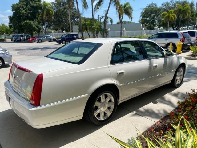 2006 Glacier White /Cashmere Cadillac DTS LOW MILES 58,287 (1G6KD57Y96U) with an 4.6L DOHC V8 Northstar Engine engine, Automatic transmission, located at 4701 North Dixie Hwy, Pompano Beach, FL, 33064, (954) 422-2889, 26.240938, -80.123474 - OUR WEBPAGE FLORIDACARS1.COM HAS OVER 100 PHOTOS AND FREE CARFAX LINK 2006 Cadillac DTS Sedan 4 DR 4.6L V8 F Gasoline 25 MPG Front Wheel Drive Features ABS Brakes Air Conditioning Alloy Wheels AM/FM Stereo Automatic Transmission Bluetooth Technology CD Audio Cruise Control Leather Seats Overhead Air- Photo#7