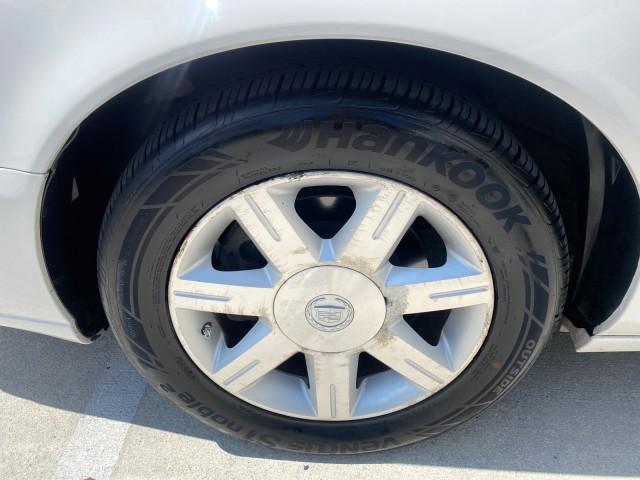 2006 Glacier White /Cashmere Cadillac DTS LOW MILES 58,287 (1G6KD57Y96U) with an 4.6L DOHC V8 Northstar Engine engine, Automatic transmission, located at 4701 North Dixie Hwy, Pompano Beach, FL, 33064, (954) 422-2889, 26.240938, -80.123474 - OUR WEBPAGE FLORIDACARS1.COM HAS OVER 100 PHOTOS AND FREE CARFAX LINK 2006 Cadillac DTS Sedan 4 DR 4.6L V8 F Gasoline 25 MPG Front Wheel Drive Features ABS Brakes Air Conditioning Alloy Wheels AM/FM Stereo Automatic Transmission Bluetooth Technology CD Audio Cruise Control Leather Seats Overhead Air- Photo#19