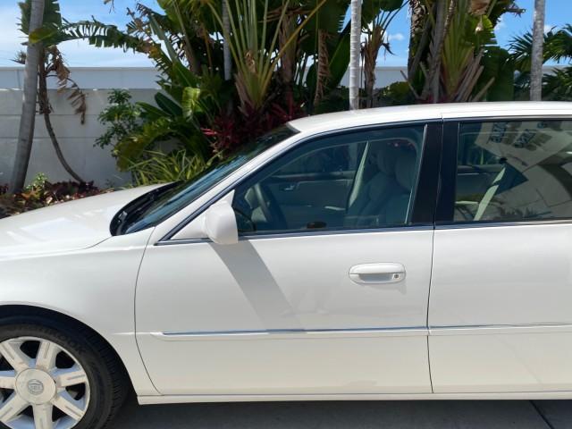 2006 Glacier White /Cashmere Cadillac DTS LOW MILES 58,287 (1G6KD57Y96U) with an 4.6L DOHC V8 Northstar Engine engine, Automatic transmission, located at 4701 North Dixie Hwy, Pompano Beach, FL, 33064, (954) 422-2889, 26.240938, -80.123474 - OUR WEBPAGE FLORIDACARS1.COM HAS OVER 100 PHOTOS AND FREE CARFAX LINK 2006 Cadillac DTS Sedan 4 DR 4.6L V8 F Gasoline 25 MPG Front Wheel Drive Features ABS Brakes Air Conditioning Alloy Wheels AM/FM Stereo Automatic Transmission Bluetooth Technology CD Audio Cruise Control Leather Seats Overhead Air- Photo#37